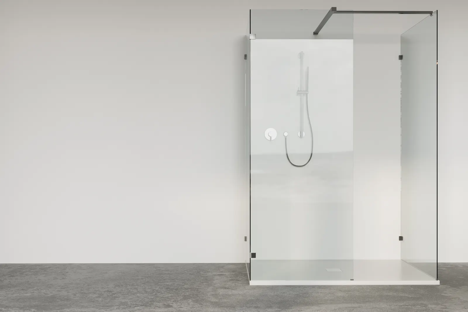 Walk-in shower with a single fixed glass splash panel and a chrome support bar.
