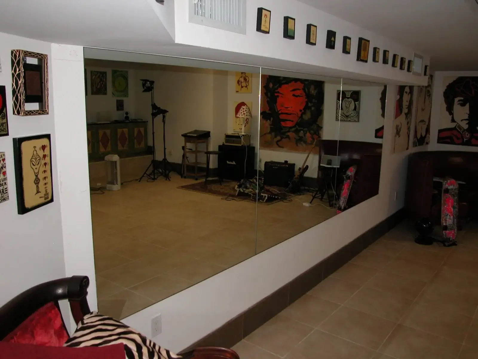 Large mirrored wall installed in an art and exercise studio.